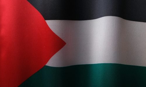 High-resolution close-up of the Palestinian flag showcasing its vibrant colors and textile texture.